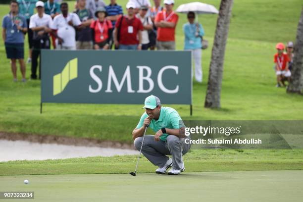 Sergio Garcia of Spain lines up his shot on the seventeenth hole of Round 2 on day 3 of the Singapore Open at Sentosa Golf Club on January 20, 2018...