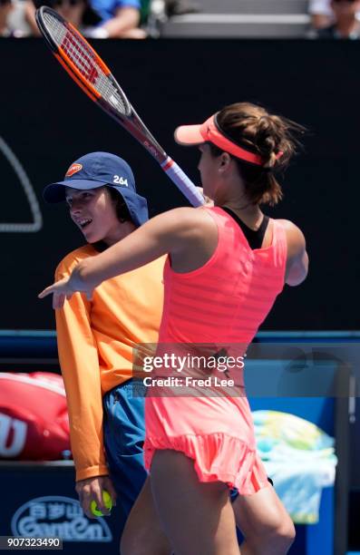 Lauren Davis of the US hits a return against Romania's Simona Halep during their women's singles third round match on day six of the 2018 Australian...