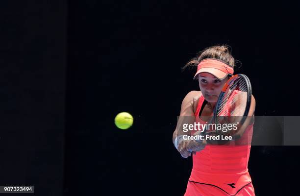 Lauren Davis of the United States plays a forehand in her third round match against Simona Halep of Romania on day six of the 2018 Australian Open at...
