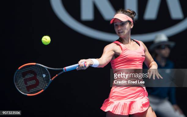 Lauren Davis of the United States plays a forehand in her third round match against Simona Halep of Romania on day six of the 2018 Australian Open at...