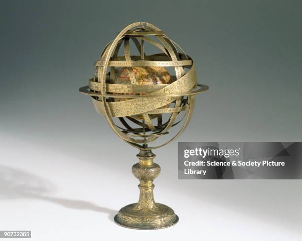 Made by Caspar Vopel of Cologne, Germany, this brass armillary sphere encloses an early example of a terrestrial globe. A broad band, finely engraved...