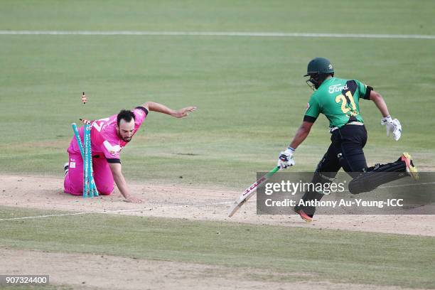 Daryl Mitchell of the Knights stumbles at the stumps trying to run out Ajaz Patel of the Stags during the Super Smash Grand Final match between the...