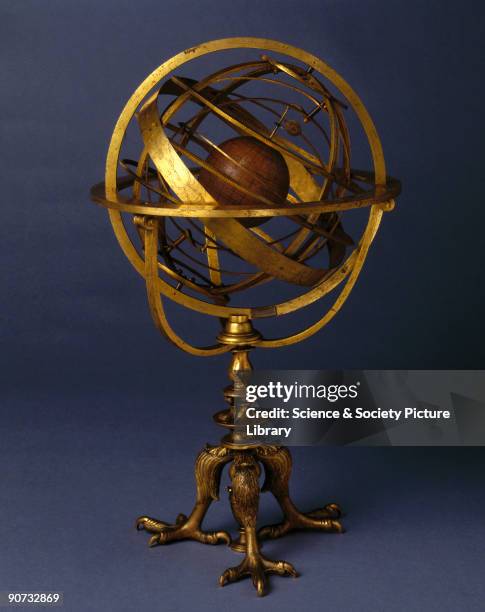 Made by Girolamo della Volpaia of Florence, Italy, this brass armillary sphere encloses a manuscript terrestrial globe. A finely engraved band with...
