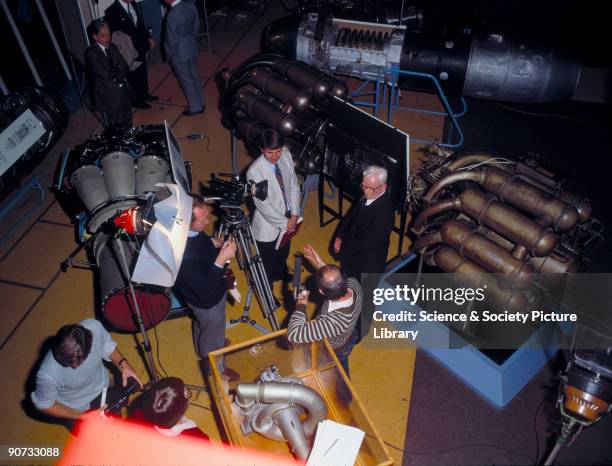 Sir Frank Whittle before an interview, with the Whittle WI engine on the left and the WV engine on the right at the Science Museum, London. Whittle...
