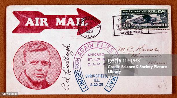 Photograph of Lindbergh with the slogan 'Lindbergh Again Flies the Airmail'. Lindbergh was an airmail pilot and later made the first solo, nonstop...