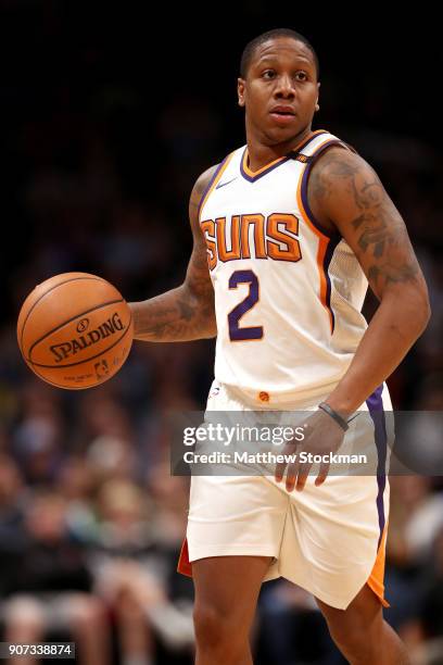 Isaiah Canaan of the Phoenix Suns brings the ball down the court against the Denver Nuggets at the Pepsi Center on January 19, 2018 in Denver,...