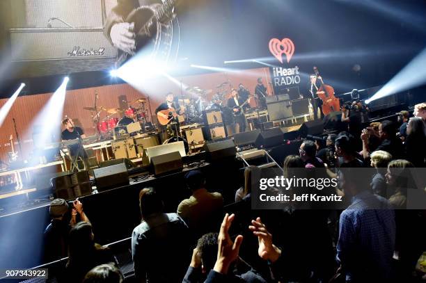 Ben Lovett, Marcus Mumford, Winston Marshall, and Ted Dwane of Mumford & Sons perform onstage during iHeartRadio ALTer Ego 2018 at The Forum on...