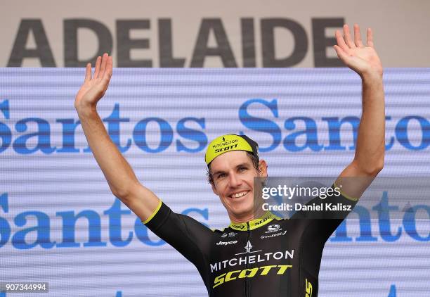 Daryl Impey of South Africa and Mitchelton-Scott celebrates on the podium after taking the leaders ochre jersey during stage five of the 2018 Tour...