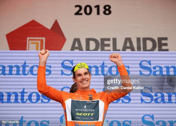 Daryl Impey of South Africa and Mitchelton-Scott celebrates on the podium after taking the leaders ochre jersey during stage five of the 2018 Tour...