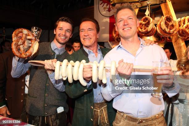 Arnold Schwarzenegger and son Patrick Schwarzenegger and nephew Patrick Knapp-Schwarzenegger during the 27th Weisswurstparty at Hotel Stanglwirt on...