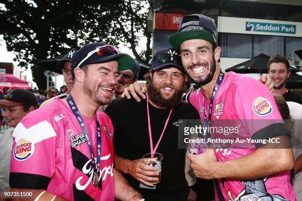Daryl Mitchell and Peter Bocock of the Knights celebrate with the fans after winning the Super Smash Grand Final match between the Knights and the...