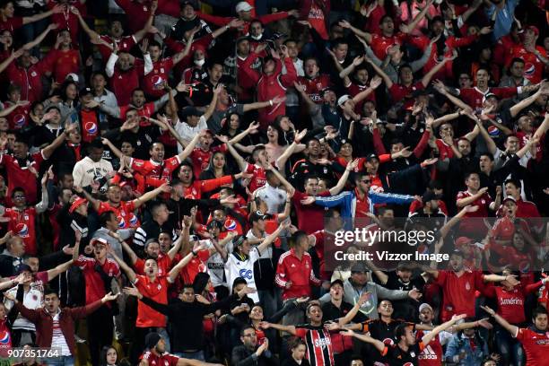 Fans of America de Cali cheer during the friendly match between Millonarios and America de Cali as par of the Torneo Fox Sports 2018 at Nemesio...