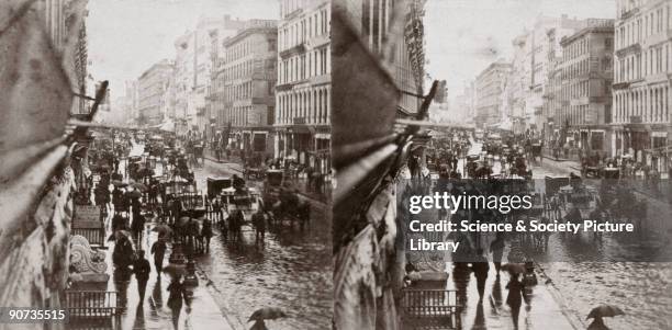 Albumen printed stereocard, photography by EH and TC Anthony, showing a stereoscopic view of Broadway on a rainy day. Since the 1890s Broadway has...