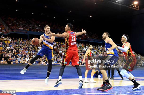 Adam Gibson of the Bullets passes the ball during the round 15 NBL match between the Brisbane Bullets and Melbourne United at Brisbane Entertainment...