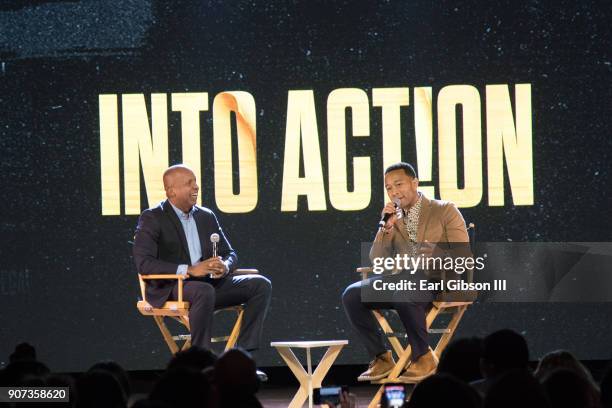 Bryan Stevenson and John Legend speak onstage at Into Action!-The Criminal Justice Moment In Los Angeles A Conversation With John Legend And Bryan...