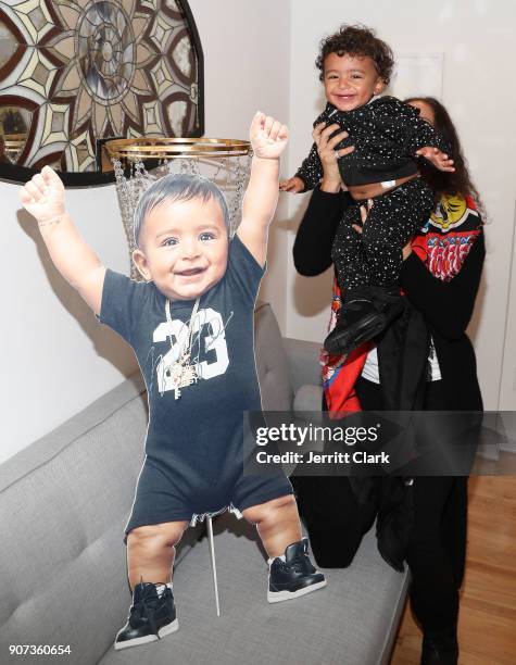 Asahd Khaled with mother Nicole Tuck attends the "For Your Information" Pop-Up Art Show hosted by FYI Brand Group And Joseph Gross Gallery on January...