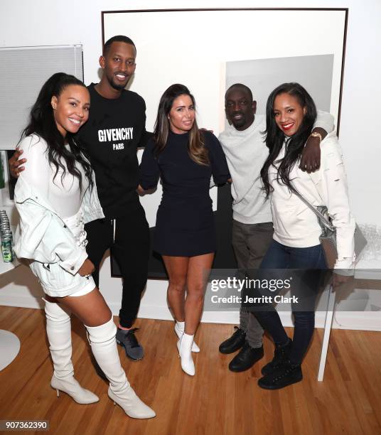 Nyanda Donaldson, Ivan Kagame, FYI Brand Group Founder Tammy Brook, Abou "Bu" Thiam and guest attend the "For Your Information" Pop-Up Art Show...