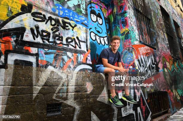 Diego Schwartzman of Argentina poses in Hosier Lane during day six of the 2018 Australian Open at Melbourne Park on January 20, 2018 in Melbourne,...