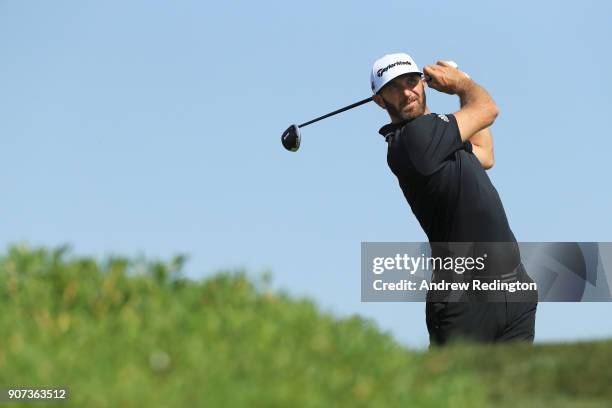 Dustin Johnson of the United States plays his shot from the third tee during round three of the Abu Dhabi HSBC Golf Championship at Abu Dhabi Golf...