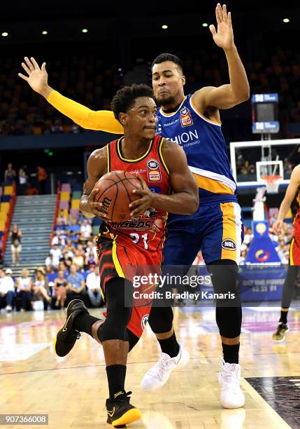 Casper Ware of United takes on the defence during the round 15 NBL match between the Brisbane Bullets and Melbourne United at Brisbane Entertainment...