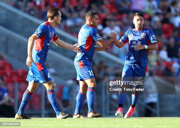 Andrew Nabbout of the Jets celebrates scoring a goal with team mate Dimitri Petratos during the round 17 A-League match between the Newcastle Jets...