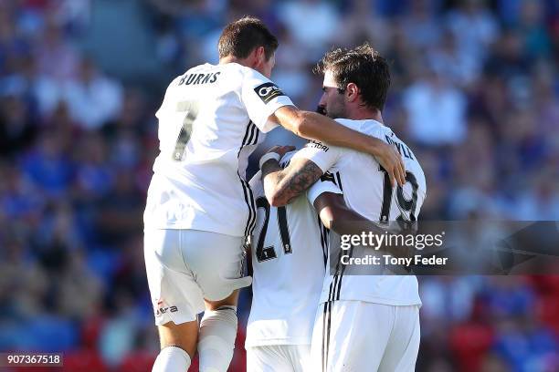 Phoenix players celebrate a goal during the round 17 A-League match between the Newcastle Jets and Wellington Phoenix at McDonald Jones Stadium on...