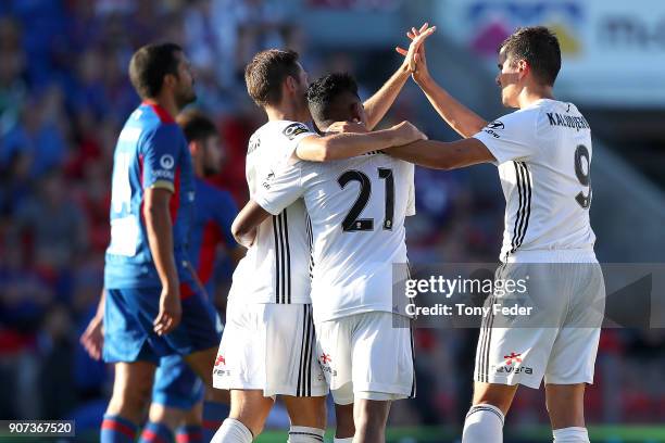 Phoenix players celebrate a goal during the round 17 A-League match between the Newcastle Jets and Wellington Phoenix at McDonald Jones Stadium on...