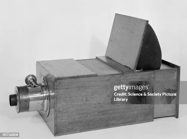Box reflex camera obscura with 2 3/8-inch meniscus lens concavo-convex of about 11 inches focal length. A camera obscura is a box or darkened rooom...