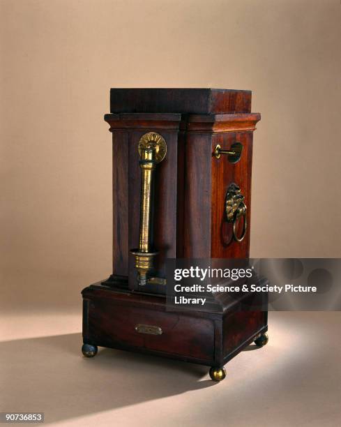 This oil lamp in a large mahogany chest was made by Lorentz. The lamp is lit by an electric spark acting on a stream of hydrogen gas passing over the...