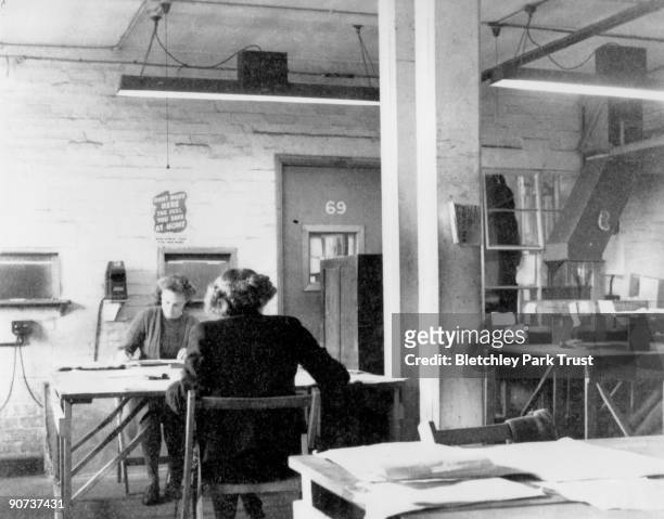 This shows personnel in the registration room in hut 6 at Bletchley Park, Buckinghamshire, the British forces' intelligence centre during WWII. The...