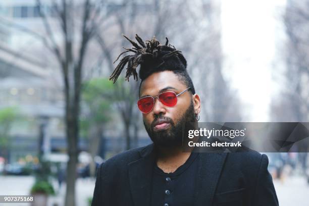 Street portrait of eccentric young man