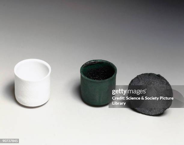 These crucibles, made from yttria, a ceramic, are used to make samples of single crystal superconductors. One of the crucibles has been used and has...