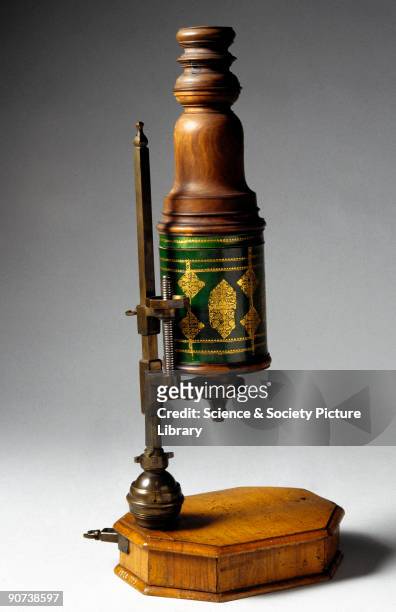 One of the few microscopes made by John Marshall that bears a date. The bottom of the drawer is stamped with the date 1715, and bears the signature...