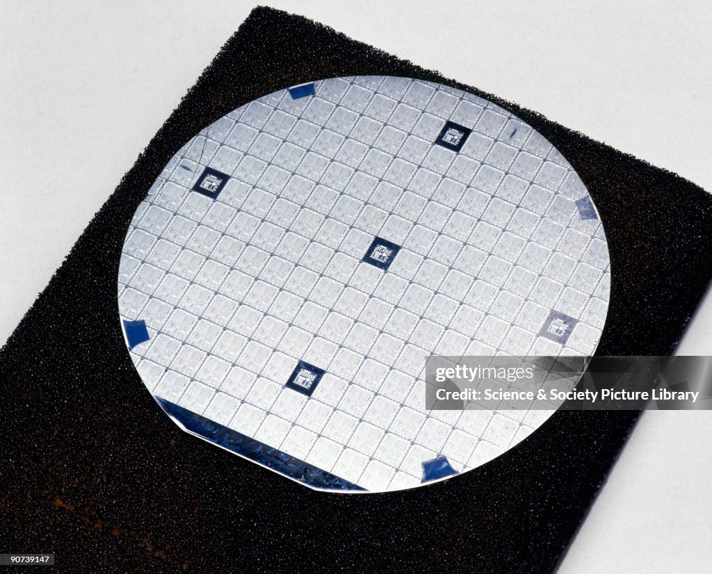 Silicon wafer used in the production of Intel 8080 microprocessor chips, 1970s.