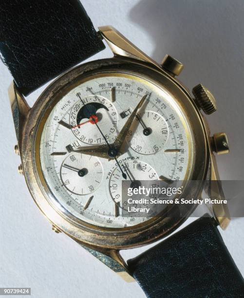 Wristwatch in a gold case made by Universal of Geneva, Switzerland. On the left of the main dial is a subsidiary seconds dial, directly opposite is a...