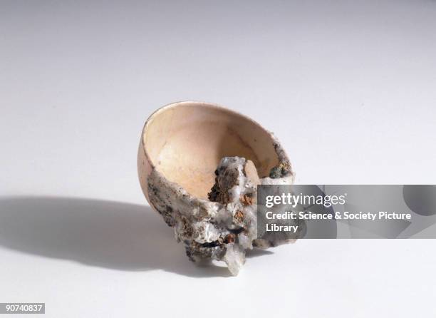 This rice bowl shows the effects of a nuclear explosion. Heat generated by the atomic explosion caused soil to be fused to the bowl. The Japanese...