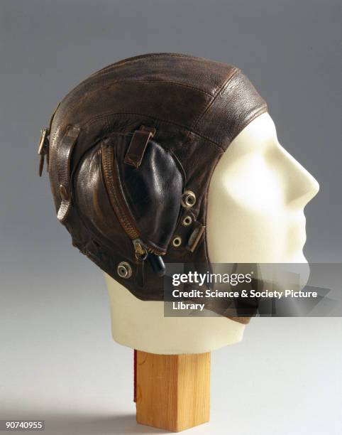 Leather flying helmet with zipped ear pockets and fittings for an oxygen mask. At the outbreak of WWII , flying helmets had changed little since WWI...