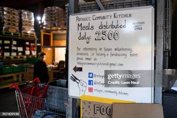 The hot meals total is seen at the "Help Refugees" charity warehouse on January 19, 2018 in Calais, France. During a visit to the UK by French...