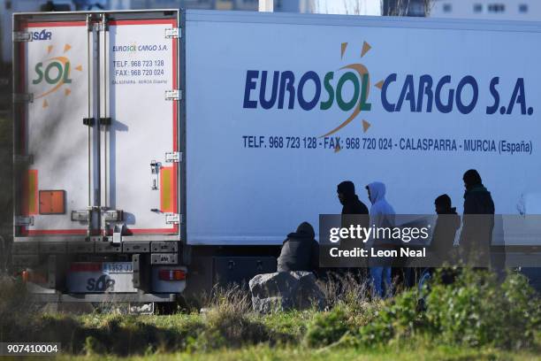 Group of young men gather near a truck depot on January 19, 2018 in Calais, France During a visit to the UK by French President Emmanual Macron, the...