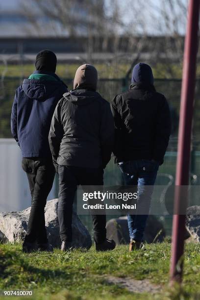 Group of young men gather near a truck depot on January 19, 2018 in Calais, France During a visit to the UK by French President Emmanual Macron, the...