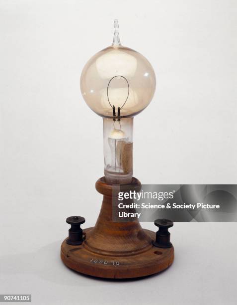 Made by the American inventor Thomas Alva Edison . Edison's lamp had a single loop of carbon which glowed when a current flowed through it. The glass...