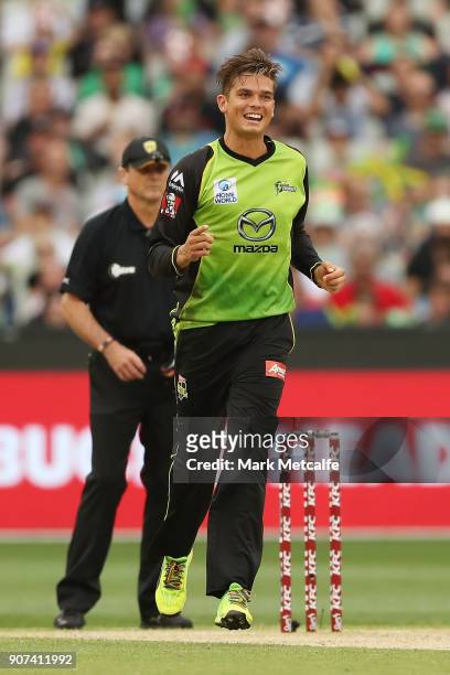 Chris Green of the Thunder celebrates taking the wicket of James Faulkner of the Stars during the Big Bash League match between the Melbourne Stars...