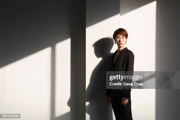 shadow of young businesswoman,portrait - portrait shadow stock pictures, royalty-free photos & images