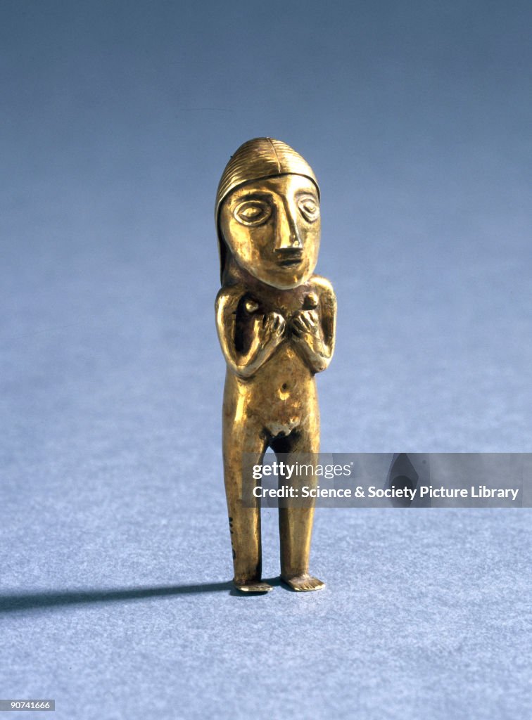 Golden Inca Statue The statue depicts a female with long hair, with her hands resting on ...