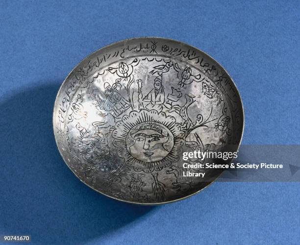 Small silver bowl with engraved figures, animals and birds, with Islamic script round the inside of the rim. Silver is used for such things as...