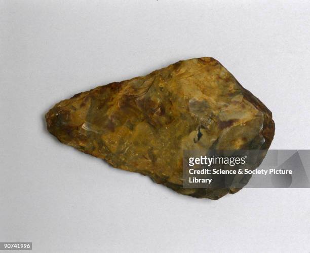 This flint handaxe, found in Kent, dates from the Old Stone age or Paleolithic period, when flint was the main material used for making tools.
