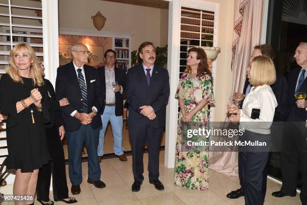 Mike Lindell and Kendra Reeves attend Mrs. Ava Roosevelt, philanthropist and author of The Racing Heart, hosts one hundred guests at her Palm Beach...