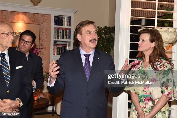 Mike Lindell and Kendra Reeves attend Mrs. Ava Roosevelt, philanthropist and author of The Racing Heart, hosts one hundred guests at her Palm Beach...