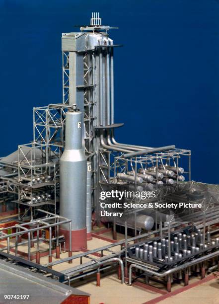 Detail of model showing fractional distillation section showing crude oil as a complex mixture of hydrocarbons - long chains of carbon and hydrogen...