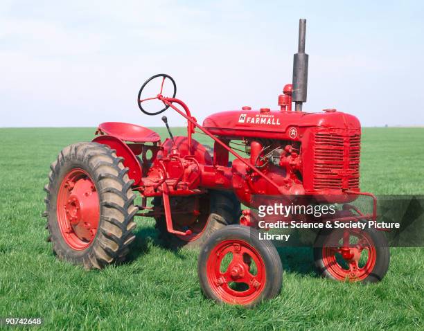 McCormick-Deering 'Farmall A' four-wheeled rowcrop agricultural tractor on pneumatic tyres, manufactured by the International Harvester Corporation ,...